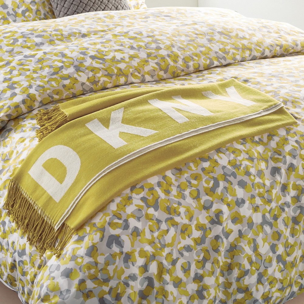 Engineered Tassel Throw By DKNY in Mustard White